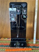 Display with 2 bracelets, 1 necklace and 3 rings