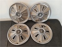 4 Ford Mustang hubcaps