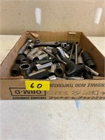 Box of a large ratchet wrenches and bits