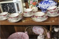 HAND PAINTED DEMITASSE CUPS AND SAUCERS
