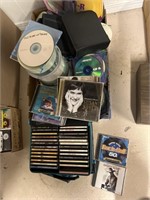 Full case of country CD’s and box of misc.