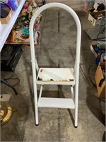 white metal step stool