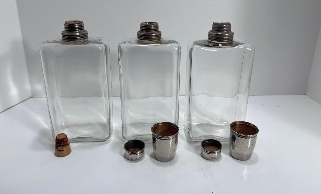 Vintage Clear Glass and Silver Cap flasks