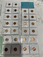14 pennies and 8 commemorative medallions