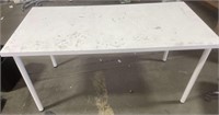 White IKEA table with stains