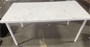 White IKEA table with stains
