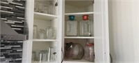 Juice/beverage Containers and cupboard of Drink