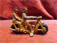 Orange cast iron Hubley PDH motorcycle toy.