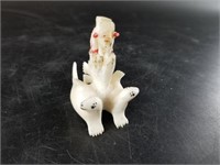 George Penatac ivory carving of 2 seals beneath ro