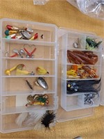 Two organizers with fishing items