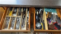 Two kitchen drawers of stainless steel, flatware,