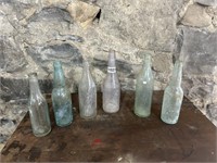 (6) ANTIQUE SODA BOTTLES