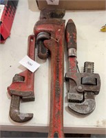 Three pipe wrenches