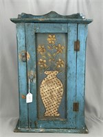 Early hanging cupboard with punched tin door