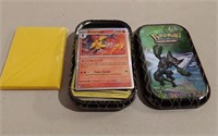 50 Pokémon Cards W/ 20 Sleeves & Tin