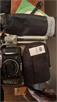 Canon camera in case with other items