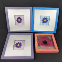Four framed dried flower art pictures
