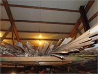 Large assortment of trim, gutter, and pipe