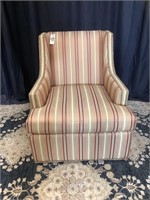 LStately upholstered regal swivel chair