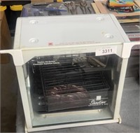 Rotisserie and barbecue showtime cooker