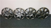 Four 17" Wheel Covers 1 With Repair