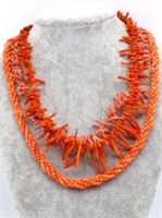 Three coral necklaces.