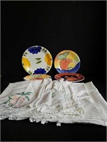 Ceramic Plates and Vintage Kitchen Towels.