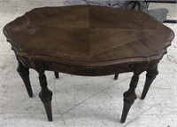 Ornate carved wood occasional table measuring 32”