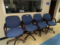 4 matching desk chairs with casters