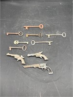 Skeleton keys and mini cap guns (one working)
