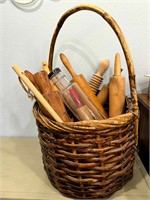 Basket with assorted kitchen utensils