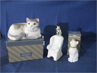 cat planter and figurines .