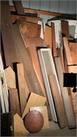 Wall of wood, windows, garage door, plywood,