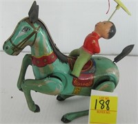 TIN WIND UP CIRCUS PONY AND RIDER