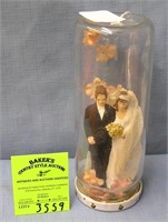 Larger chalkware bride and groom figure