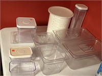 Clear food pans with lids.