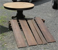 Oak round top pedestal extension table with carved