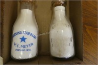 2 vintage Portage milk bottles