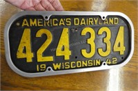 1942 license plate with framing