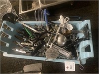 Dish Rack full of Many Utensils and kitchen tools