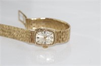 Vintage Tudor watch with hallmarked 9ct gold band