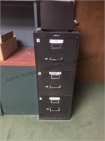 Three drawer filing cabinet and desktop file