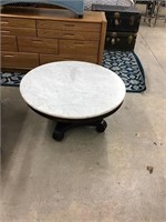 Early Victorian round marble top coffee table. 36