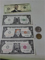 Play money and the Sacagawea dollar with a half