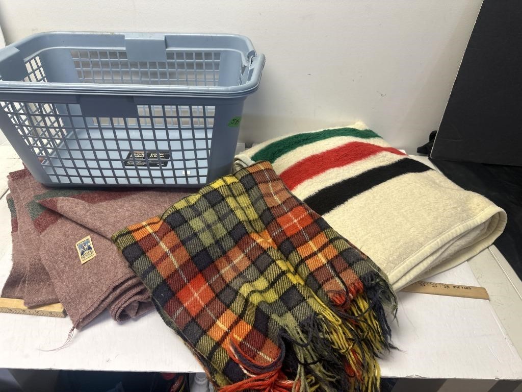 Laundry basket with assorted blankets- were