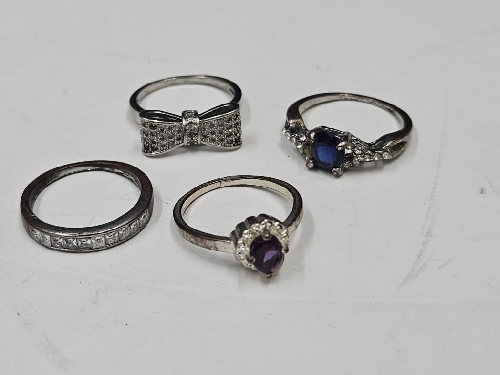 4 Various Size Rings  marked 925 Silver