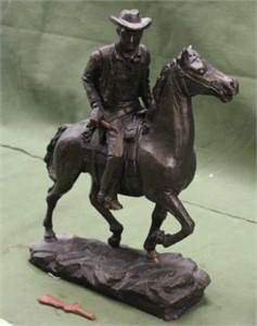 Cowboy On A Horse Statue