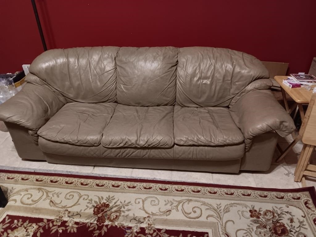 Leather sofa and as is condition check pictures