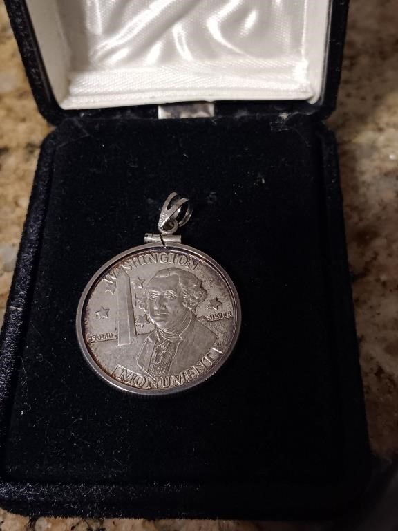 Solid silver Washington monument coin pendant