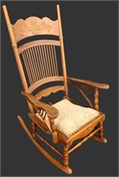 Upholstered Rocker with Carvings